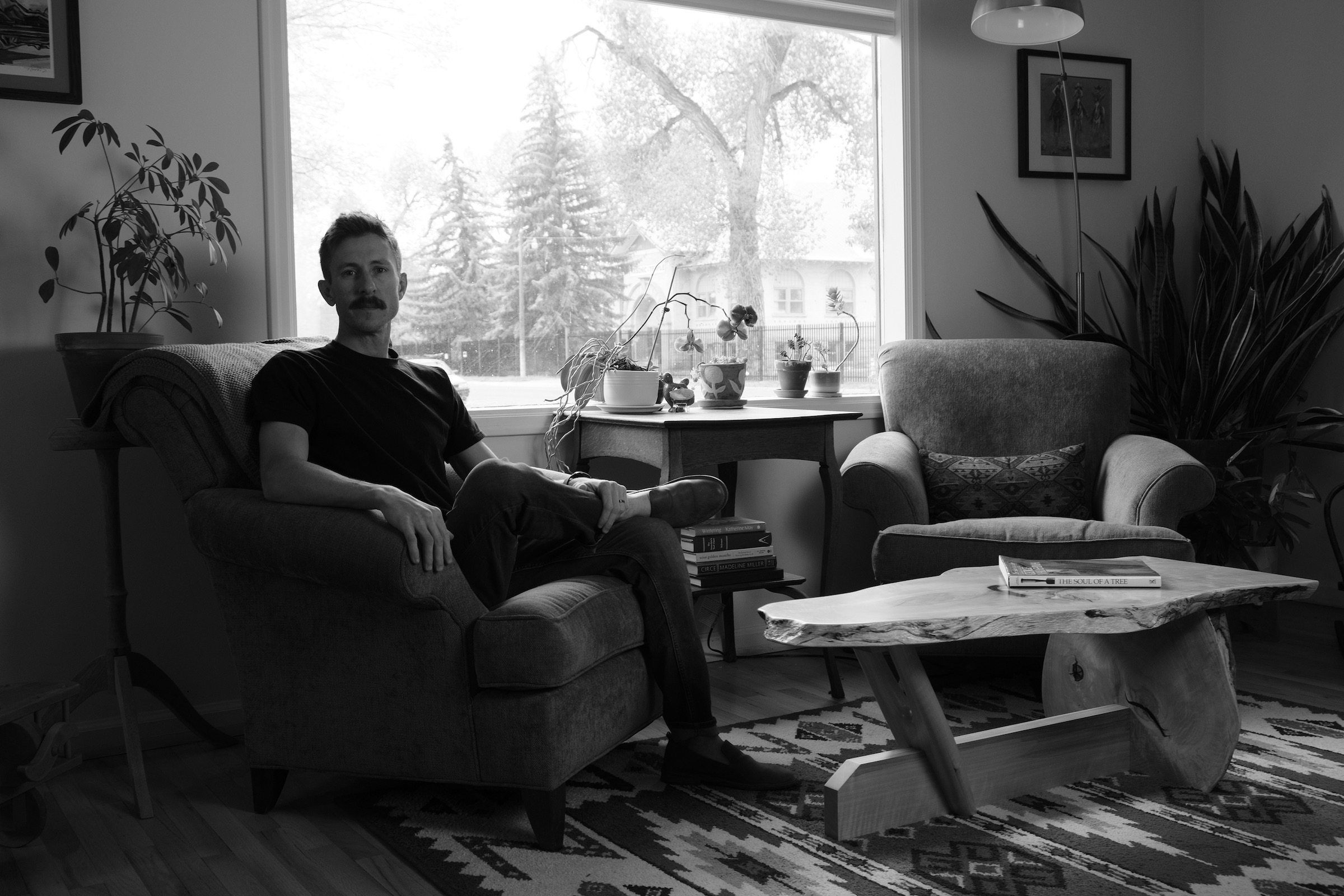 Tyler at home with a Vollick House coffee table